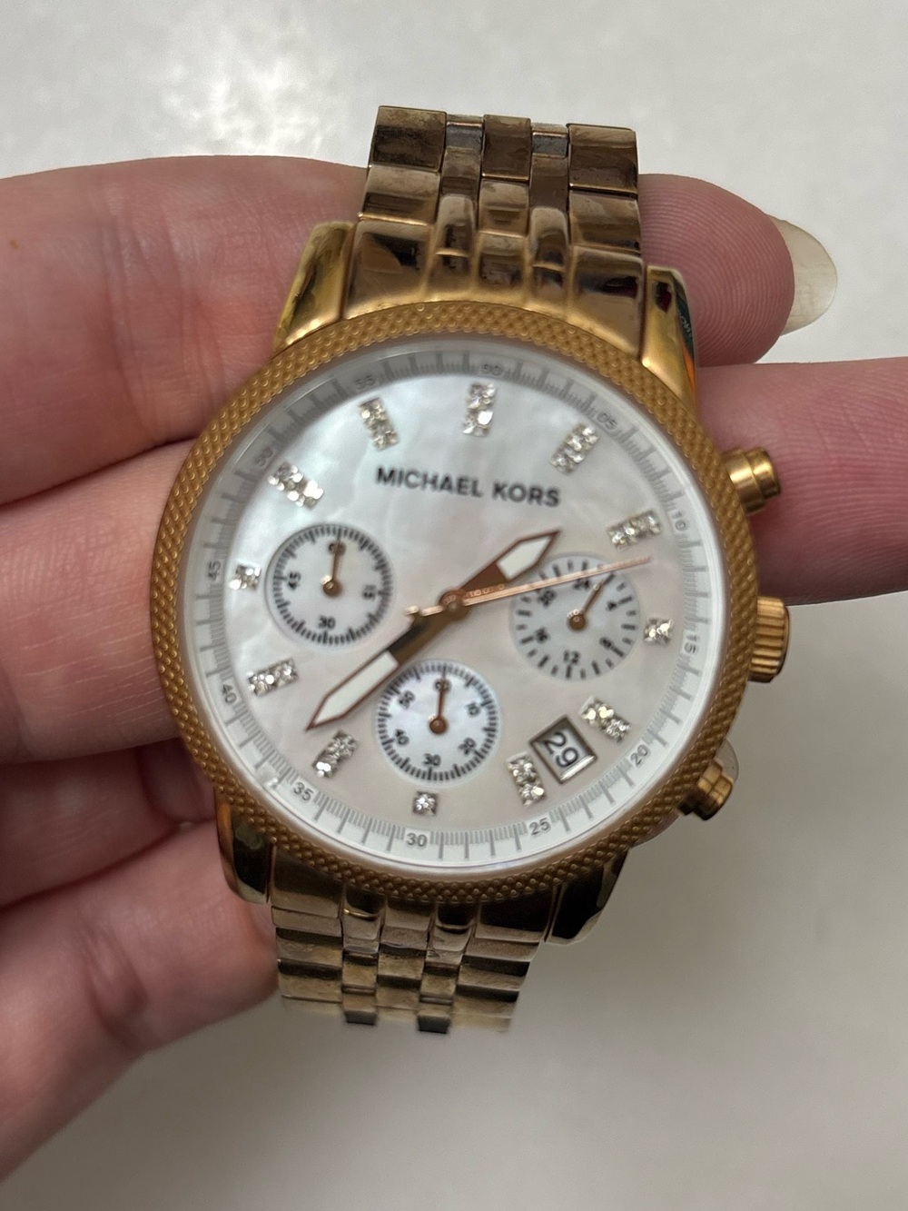 Michael Kors Women's Gold Chronograph Watch with a Pearl Face and White Dial